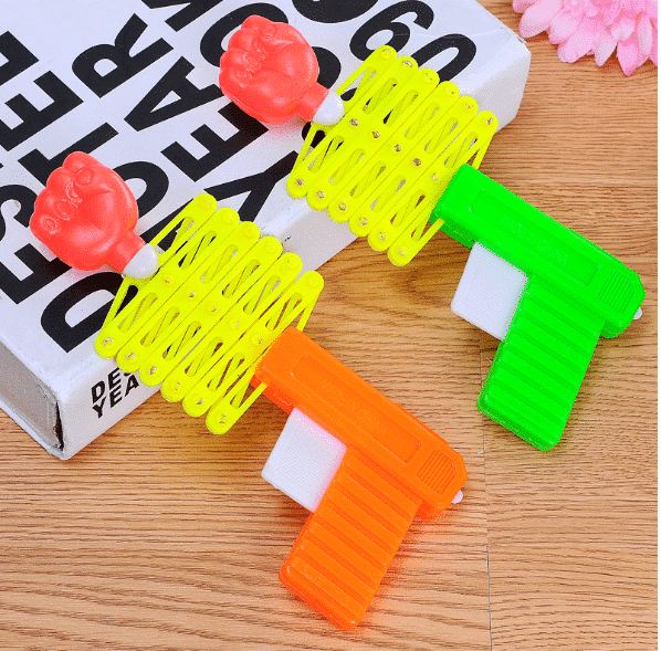 Stretchy Fist Prank Gun: Classic Children's Toy for Endless Fun - Surprising Action in a Compact Size! - Image 2